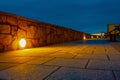 Illuminated walking path way at night. Warm and cool colors. Night scene Royalty Free Stock Photo