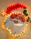 Illuminated Wall decoration of Father Christmas & his smiling face