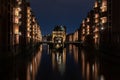 Illuminated Wasserschloss water castle - famous historic building in Hamburg