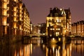 Illuminated water castle in Hamburgs old warehouse district