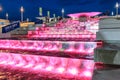 The illuminated waterfall cascade at the Olympic Park enchants with its beautiful play of water and light