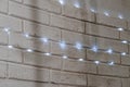 Illuminated White Brick Wall with Soft Blue LED Strips Royalty Free Stock Photo