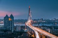 Illuminated Yangpu Bridge and skyline in Shanghai at night Royalty Free Stock Photo