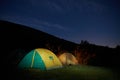 Illuminated yellow camping tent