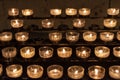 Illuminated Yellow Candles in Cologne cathedral church, Christmas night, Germany