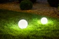 Illumination backyard light garden with 2 electric ground lanterns.