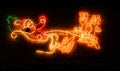 Illumination Santa Claus sleigh with reindeers at christmas in UK