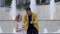 Illusionist show magic trick with balls to a little girl