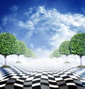 Illusive chess surface with green trees Royalty Free Stock Photo