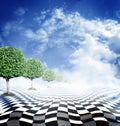 Illusive chess surface with green trees Royalty Free Stock Photo