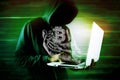 Illustrated hand holds bitcoin icon. hacker holding laptop