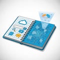 An illustrated open notebook displays digital and data themed graphics Royalty Free Stock Photo