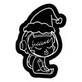 quirky cartoon icon of a pretty astronaut girl sitting waiting wearing santa hat Royalty Free Stock Photo