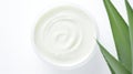 Aloe vera cream with aloe vera leaves on white