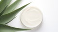 Aloe vera cream with aloe vera leaves on white