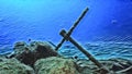 Oil painting of an anchor underwater