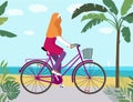 girl on bicycle in hijab near beach riding