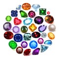 background with a set of jewelry gems of different colors and cuts collected in a circle Royalty Free Stock Photo