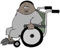 Ethnic man sitting in a wheelchair