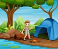 Boy in explorer outfit camping out in nature Royalty Free Stock Photo