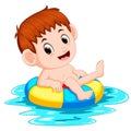 The boy swims in the pool with the ring ball Royalty Free Stock Photo