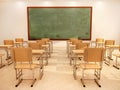 Illustration of bright empty classroom with desks and chairs