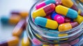 Illustration of bright multi-colored pills in a jar with soft background. Royalty Free Stock Photo