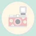 Illustration of camera decorated with flower