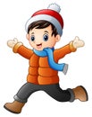 Cartoon boy wearing winter clothes Royalty Free Stock Photo
