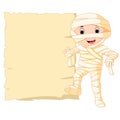 Cartoon Egyptian mummy with blank sign