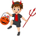 Cartoon little boy in costume devil holding a lucifer and candy basket in pumpkin Royalty Free Stock Photo