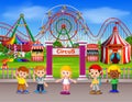 Childrens having fun in amusement park at daytime