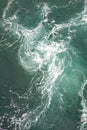 An illustration of the churning green water of a cruise ship wake on the Pacific Ocean Royalty Free Stock Photo