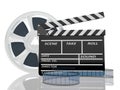 Illustration of cinema clap and film reel, over Royalty Free Stock Photo