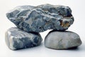 Close up of a group of stones in different colors on white background Royalty Free Stock Photo