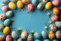Colorful easter eggs on a blue background with space for text at the top. a border of colorful easter eggs frames the flat la Royalty Free Stock Photo