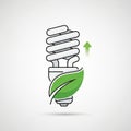 Illustration of a compact fluorescent light bulb with a green leaf wrapped around it, Royalty Free Stock Photo
