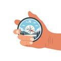 Illustration of a compass in a hand. Compass icon with landscape nature. Royalty Free Stock Photo