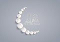 Crescent Moon made by pearls and Arabic Islamic Calligraphy of text Eid-Al-Adha