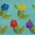 Illustration. Cross-stitch. Periwinkle flowers. Texture of flowers. Seamless pattern for continuous replicate. Floral background,