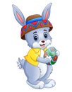 Cute cartoon rabbit carrying easter eggs