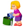 Cute girl with a trash bag near the garbage container Royalty Free Stock Photo