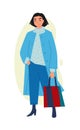 Illustration of a cute girl. Vector. Woman shopper shopper with purchases. Casual style of dress. Flat style. Image is isolated on Royalty Free Stock Photo