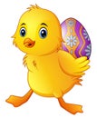 Cute little duck carrying a decorated egg Royalty Free Stock Photo