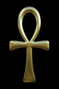 Golden ankh symbol on black background