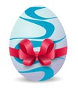 Easter egg with red bow on white background