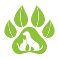 Emblem organic products for animals. template for pet store silhouette of a dog and cat on the background of paws with leaves