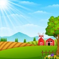 Farm landscape with shed and red windmill on daylight Royalty Free Stock Photo