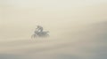 A fast military motorcycle riding through desert dunes Royalty Free Stock Photo