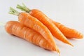 Featuring a three orange carrots on a white background, high quality, high resolution Royalty Free Stock Photo